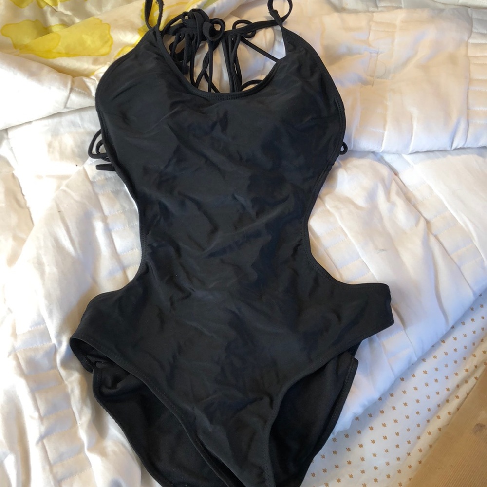 Backless Black one piece bathing suit with sides cut out
